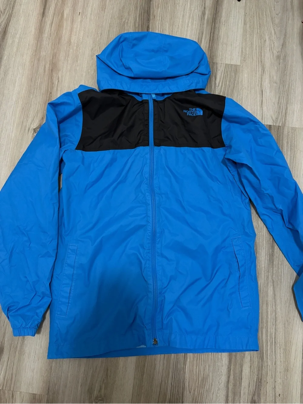 The North Face Blue and Black Hooded Rain Jacket